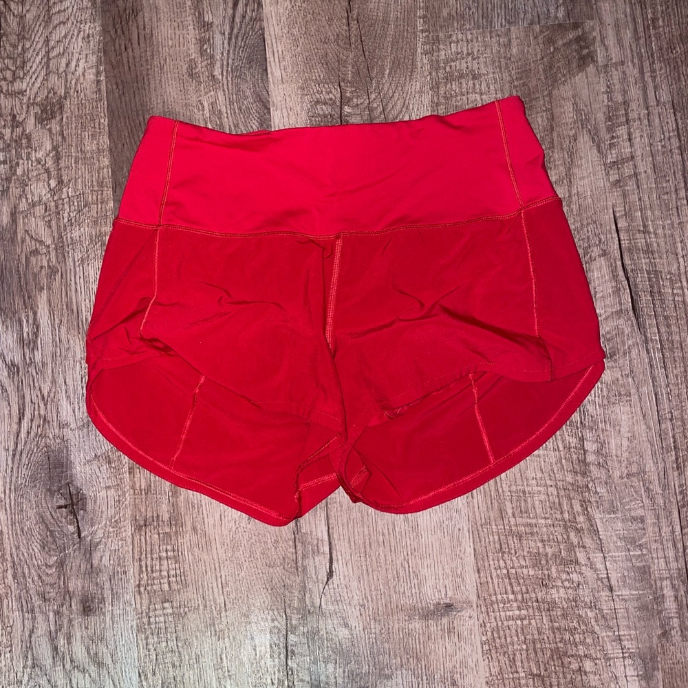 Lululemon Athletica Red Athletic Shorts with Curved Hem